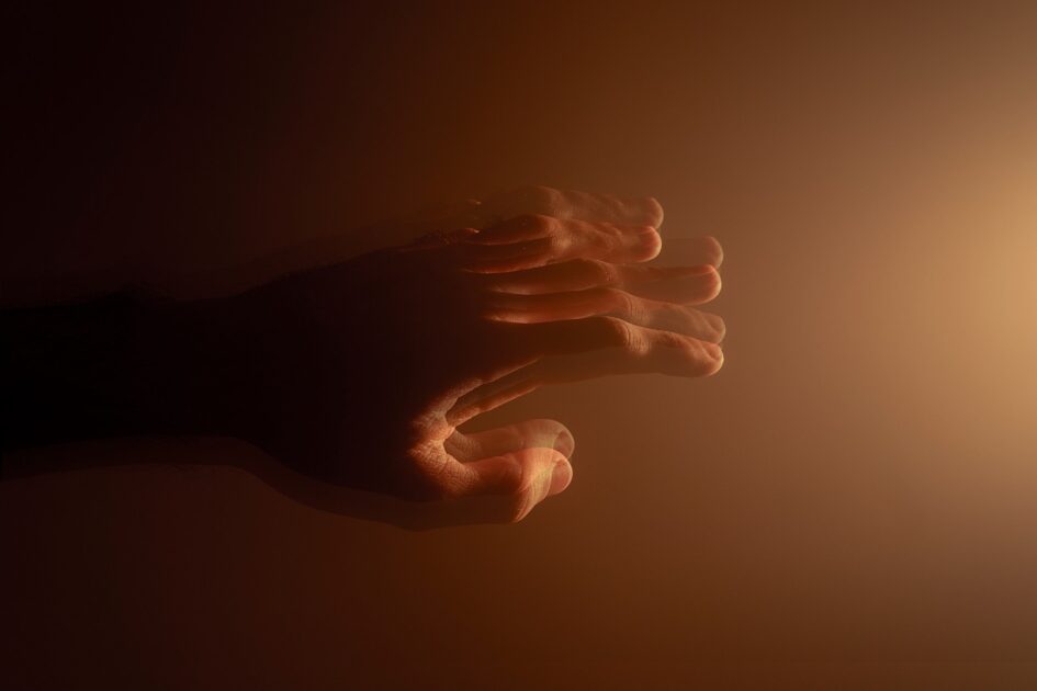 Shaky hands of a person with Parkinson's disease